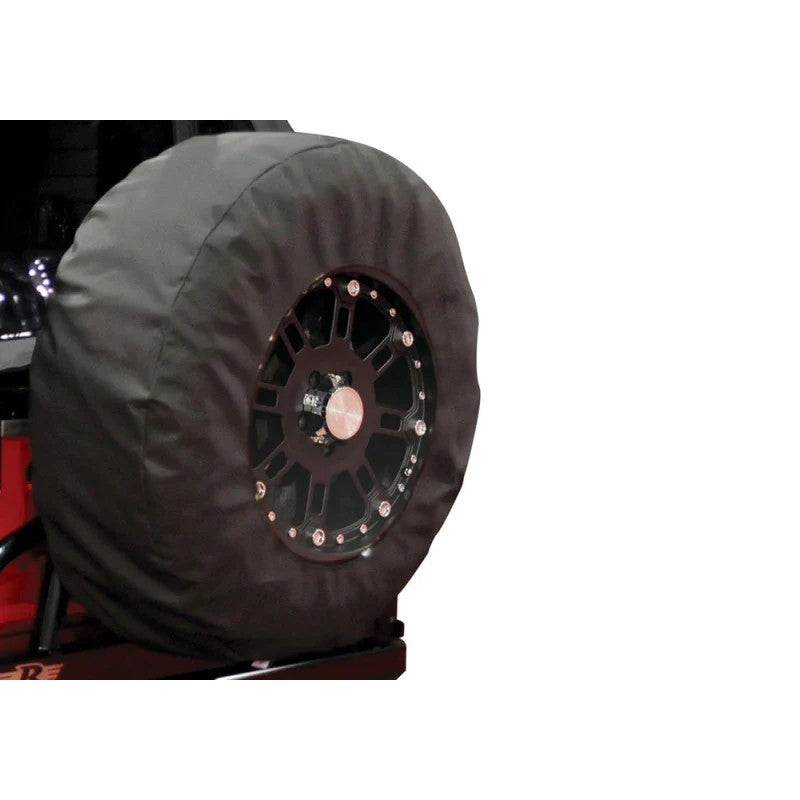 Black Diamond denim spare tire cover with 17-inch clear center window and drawstring closure.