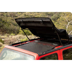 Black Rampage extended mesh shade top providing front and rear coverage on a Jeep Wrangler JL 4-Door.