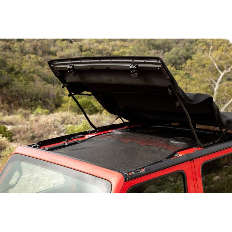 Black Rampage extended mesh shade top providing front and rear coverage on a Jeep Wrangler JL 4-Door.