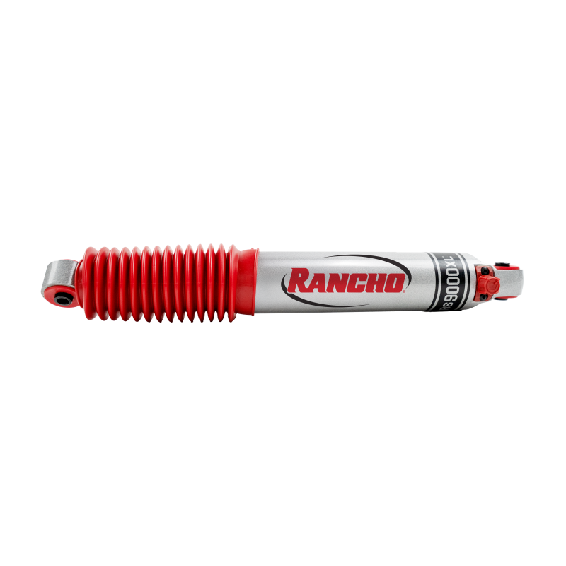 Rancho RS9000XL adjustable shock absorber featuring a liquid metallic finish and red polyvinyl protective boot.