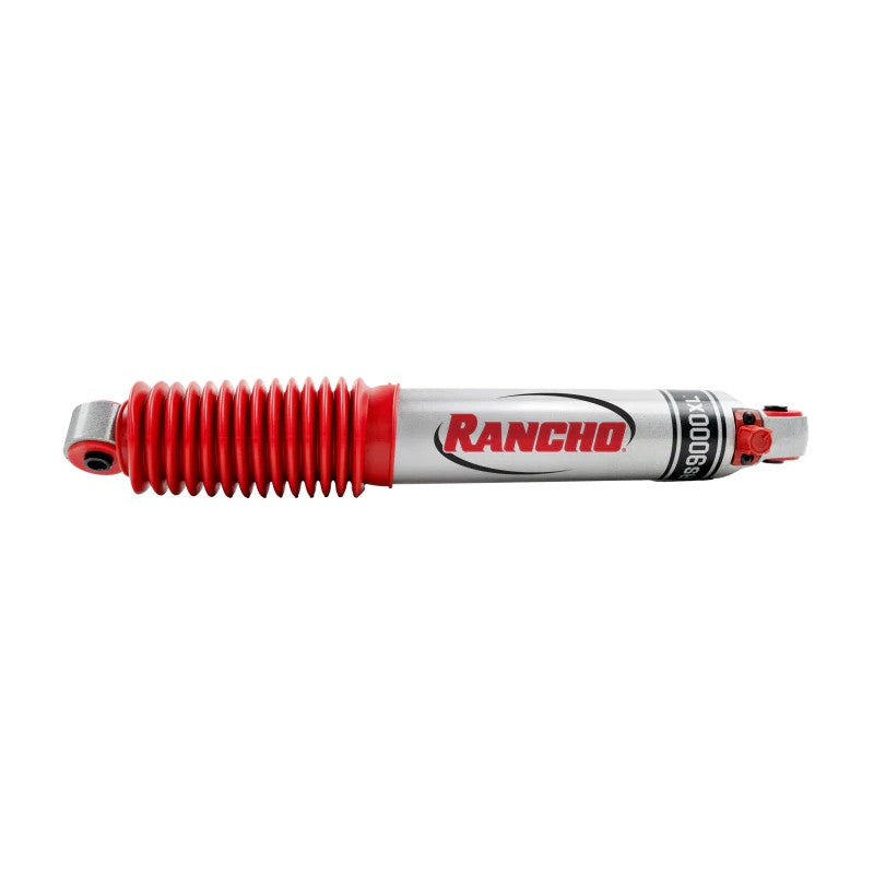 Rancho RS9000XL series adjustable shock absorber with red protective boot and 9-position adjustment knob.