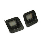 Pair of Raxiom Axial Series LED license plate lamps with 18 LEDs and black housings for 2003-2018 Dodge/Ram 1500.