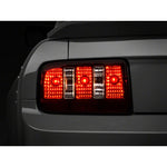 Raxiom Coyote tail lights for 2005-2009 Ford Mustang featuring black housings and smoked lenses.