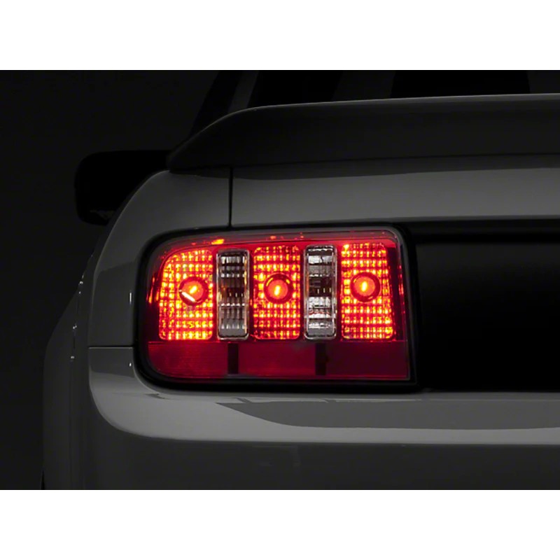Raxiom Coyote style tail lights for 2005-2009 Ford Mustang with chrome housings and red/clear lenses.