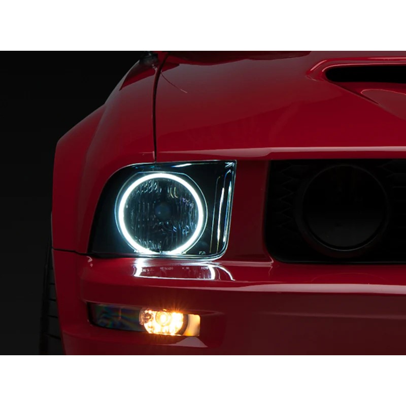 Raxiom Axial Series black projector headlights with CCFL halo rings and smoked lenses for 2005-2009 Mustang.