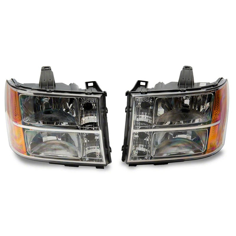 Raxiom Axial OEM Style chrome housing headlights with clear lenses for 2007-2014 GMC Sierra 1500, 2500 HD, and 3500 HD.