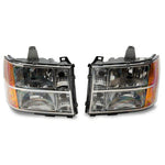 Raxiom Axial OEM Style chrome housing headlights with clear lenses for 2007-2014 GMC Sierra 1500, 2500 HD, and 3500 HD.
