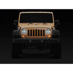 Raxiom Axial Series 7-inch round black LED headlights with clear lenses and integrated DRL for Jeep Wrangler JK.