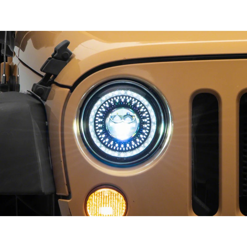 Raxiom Axial Series 7-inch LED projector headlights with Dragon Eye halo accents and black housings.