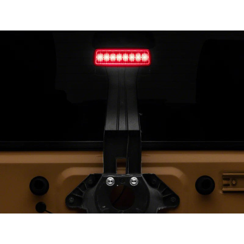 Raxiom Axial Series red LED hyper flash third brake light with black housing for 2007-2018 Jeep Wrangler JK.