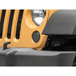 Raxiom Axial Series smoked LED turn signal housings with amber LEDs for 2007-2018 Jeep Wrangler JK
