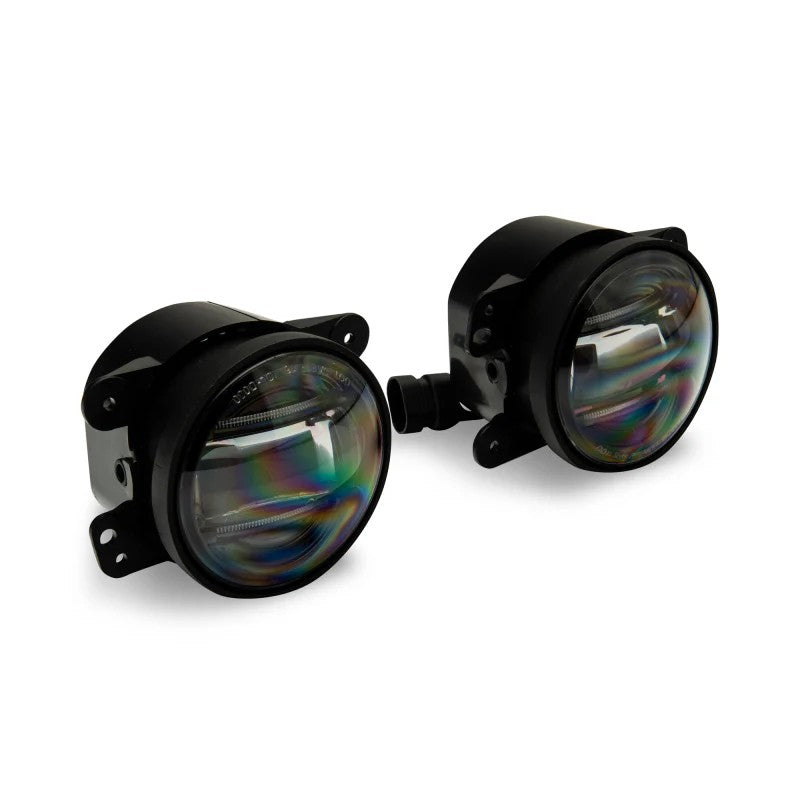 Raxiom Axial Series 4-inch round LED fog lights with integrated dual white DRL accent bars and glass lenses.