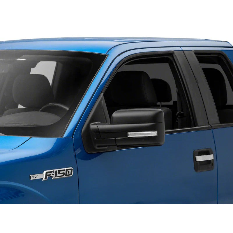 Pair of Raxiom Axial Series white LED mirror turn signals with clear lenses and black ABS housings for Ford F-150.