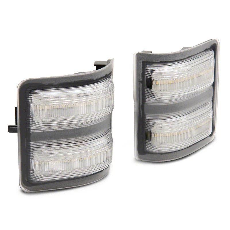 Raxiom Axial Series clear lens LED switchback mirror marker lamps for 2011-2016 Ford F-250 and F-350 Super Duty.