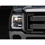 Raxiom LED projector headlights with chrome housings and clear lenses for 2011-2016 Ford F-250 and F-350 Super Duty trucks.