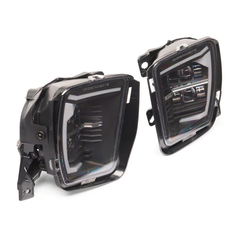 Raxiom Axial Series LED fog lights with integrated white DRL accents and black housings for 2013-2018 Ram 1500