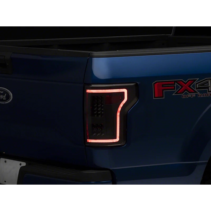 Raxiom sequential LED tail lights with black housings and clear lenses for 2015-2017 Ford F-150.
