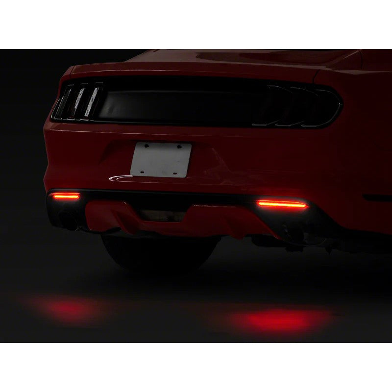 Raxiom Axial Series smoked rear diffuser marker lights with red LEDs for 2015-2017 Ford Mustang.