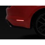 Pair of Raxiom Axial Series rear side marker lights with smoked lenses and red LED strips for 2015-2023 Ford Mustang.