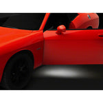 Raxiom Axial Series LED door courtesy lamps with clear lenses and white LED emitters for 2015-2023 Dodge Challenger