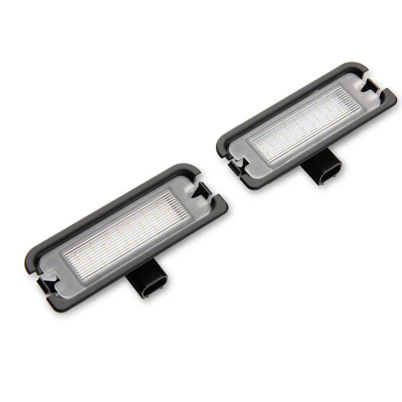 Raxiom Axial Series LED license plate lamps with clear lenses for 2015-2023 Ford Mustang.