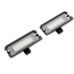 Raxiom Axial Series LED license plate lamps with clear lenses for 2015-2023 Ford Mustang.