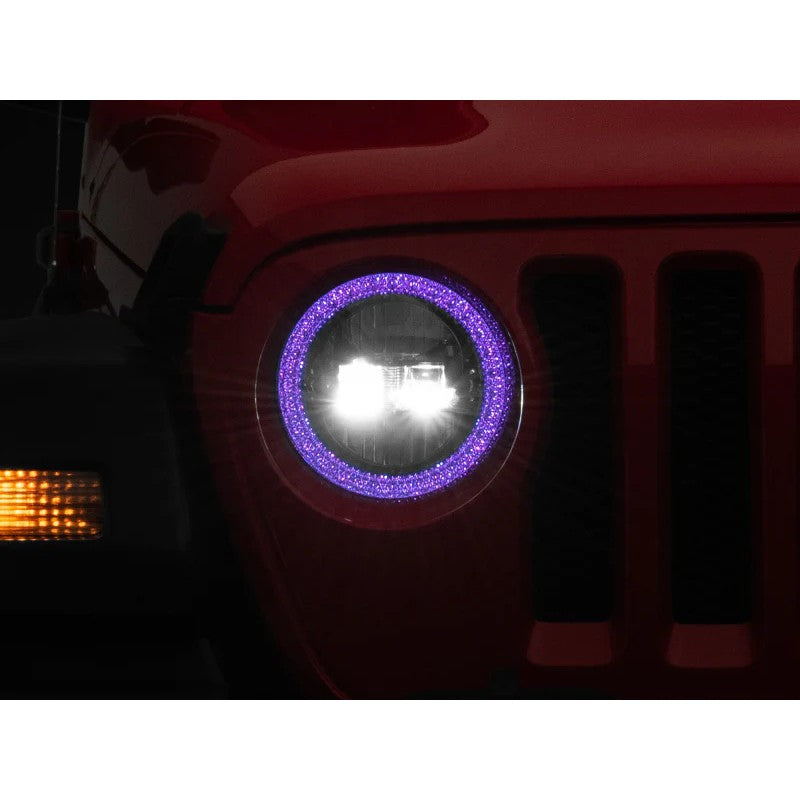 Raxiom Axial 9-inch black housing LED headlights with illuminated RGB halos and clear polycarbonate lenses for Jeep JL and JT.