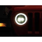 9-inch round black housing LED headlights with white DRL halo rings and clear lenses for Jeep Wrangler and Gladiator.