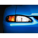 Raxiom Axial Series Cobra style headlights with black housings and clear lenses for 1994-1998 Ford Mustang.