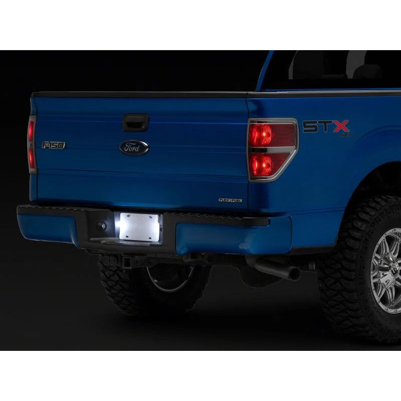 Pair of Raxiom Axial Series LED license plate lamp assemblies for 1997-2014 Ford F-150.