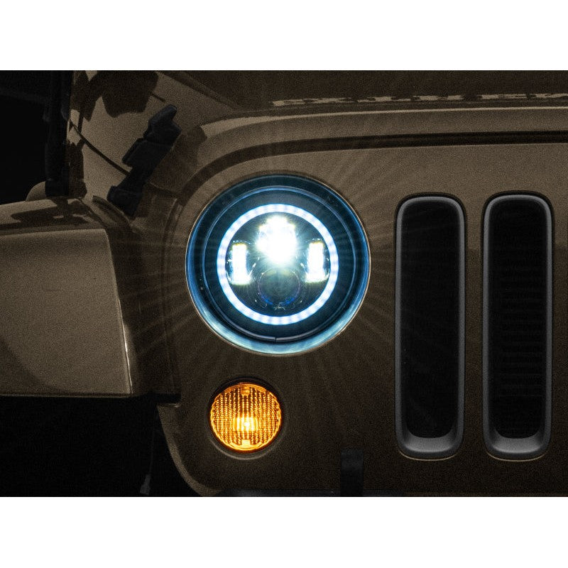 Pair of 7-inch round black housing LED projector headlights with clear lenses and integrated RGB halo rings