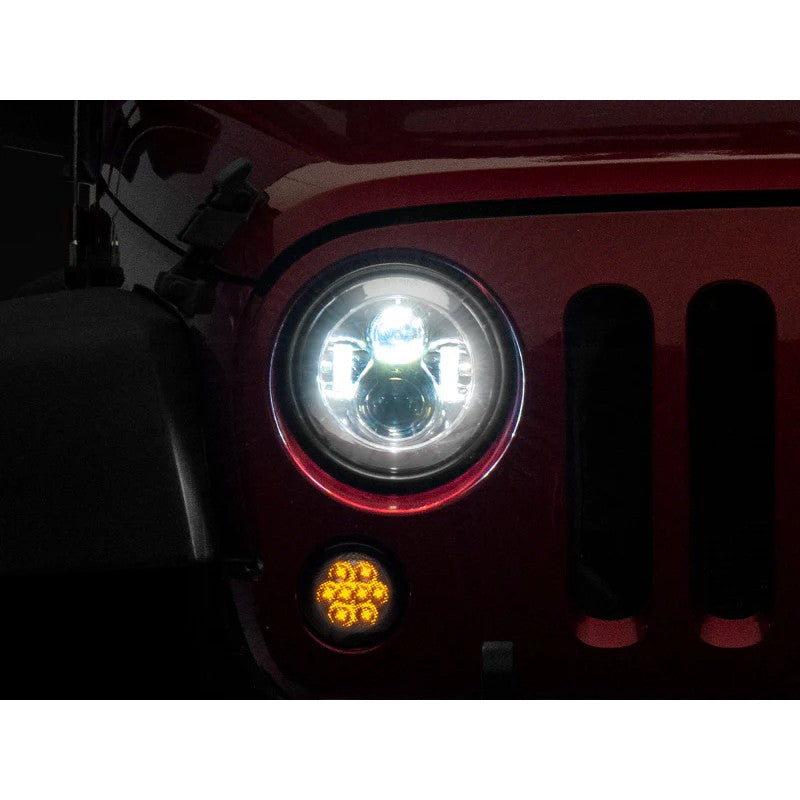 Pair of Raxiom Axial Series 7-inch LED Daymaker headlights with chrome housings and clear lenses