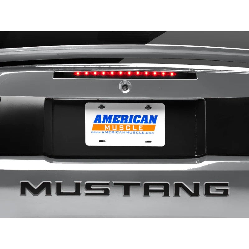 Raxiom smoked lens LED third brake light assembly for 1999-2004 Ford Mustang.