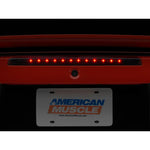 Raxiom Axial Series Smoked LED Third Brake Light for 1999-2004 Ford Mustang showing the 12-LED array and black housing.