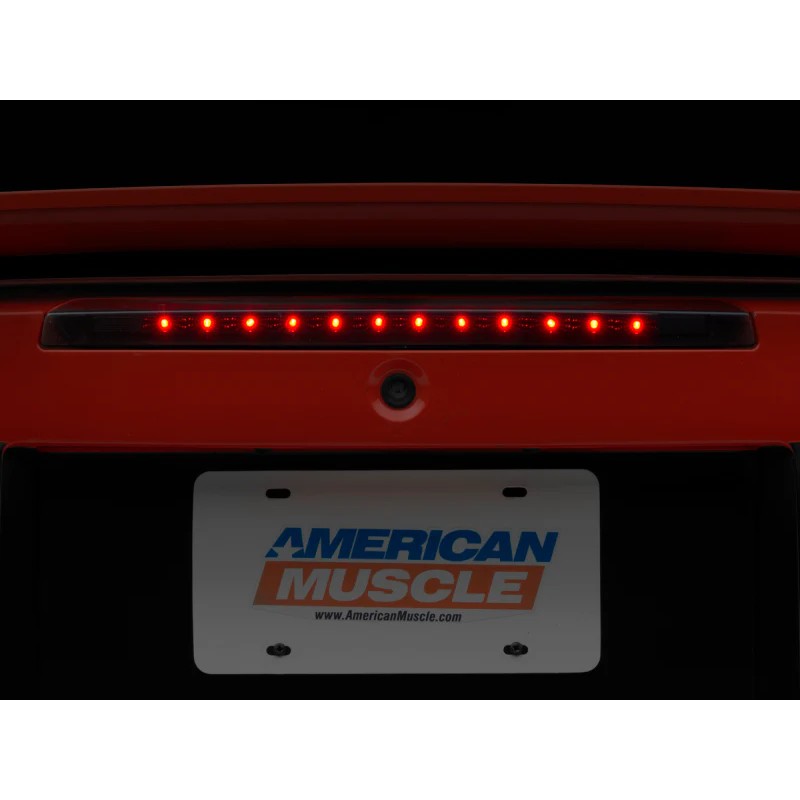 Raxiom Axial Series Smoked LED Third Brake Light for 1999-2004 Ford Mustang showing the 12-LED array and black housing.