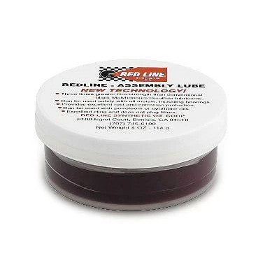 4oz jar of Red Line Assembly Lube for protecting engine components like camshafts and bearings during assembly.