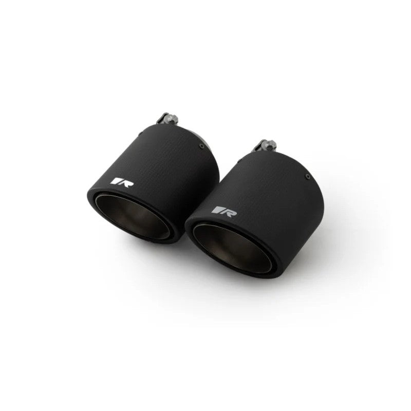 Pair of Remus 102mm carbon fiber exhaust tips with titanium internals and angled cut design.