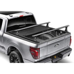 Matte black RetraxPRO XR retractable truck bed cover with integrated T-slot accessory rails.