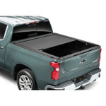 RetraxPRO MX matte black double-wall aluminum retractable tonneau cover on a 2022-2026 GMC Hummer EV Pickup with 5ft bed.