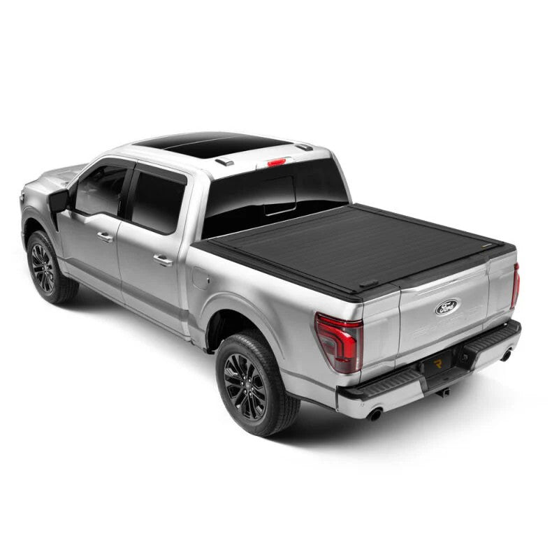 RetraxPRO EZ-Off matte black aluminum retractable truck bed cover for a 2024-2026 Toyota Tacoma 5ft bed.