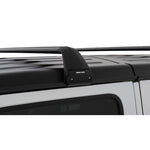 Black Rhino-Rack Vortex SG 2 bar roof rack with flush-style crossbars and rain gutter mounting feet.