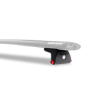 Two black Rhino-Rack RLT600H Quick Mount legs with trigger locking mechanism for roof rack track mounting.