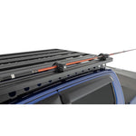 Rhino-Rack RSIT2 Stow It Utility Holder in black with rubber grip inserts and Zwifloc mounting hardware.