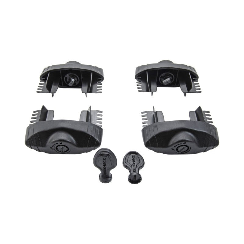 Four black Rhino-Rack Vortex Secure Core locking end caps and two metal keys on a white background