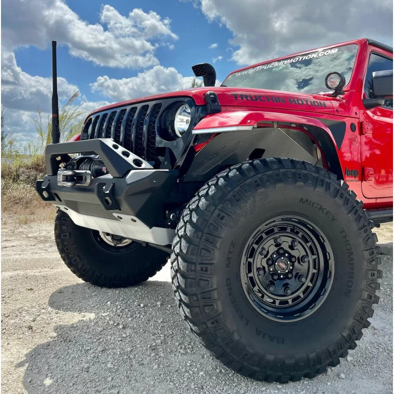Rival black aluminum front bumper with integrated winch mount, skid plate, and grill guard for Jeep Wrangler and Gladiator.