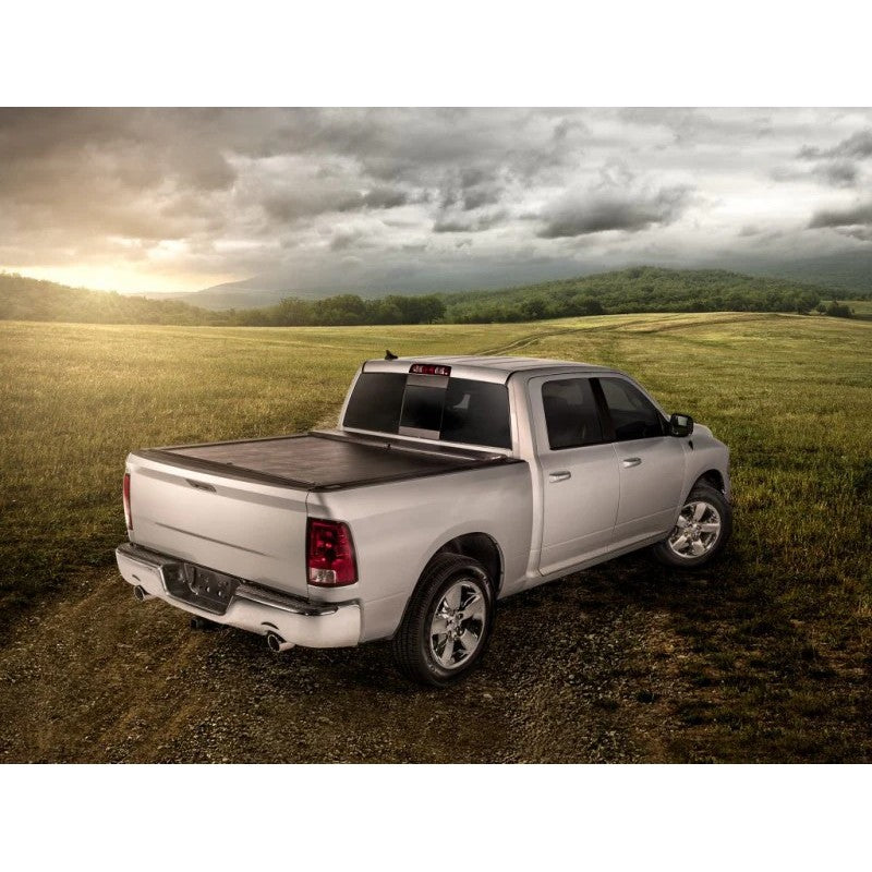 Roll-N-Lock M-Series retractable tonneau cover with black vinyl-over-aluminum slats and low-profile housing.
