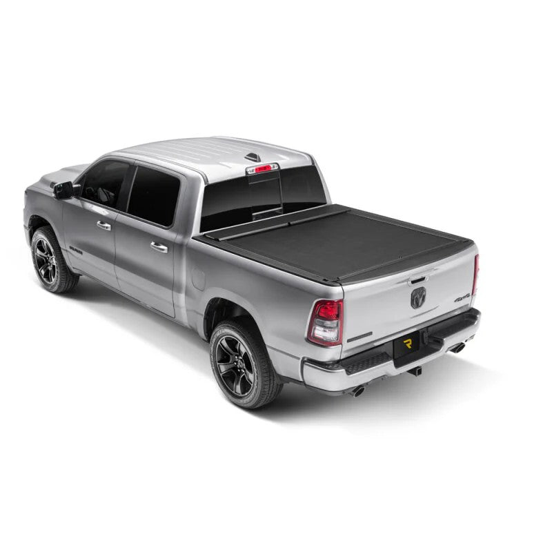 Roll-N-Lock M-Series retractable tonneau cover with vinyl-over-aluminum slats installed on a Ram 1500 truck bed