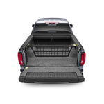 Roll-N-Lock CM226 Cargo Manager movable bed divider installed on a Chevy Silverado 2500 HD truck bed