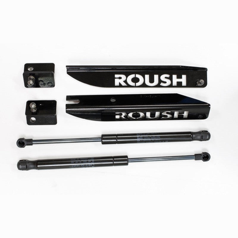 Roush gas-charged hood struts with black e-coated stainless steel laser-cut brackets installed on a Ford Mustang.