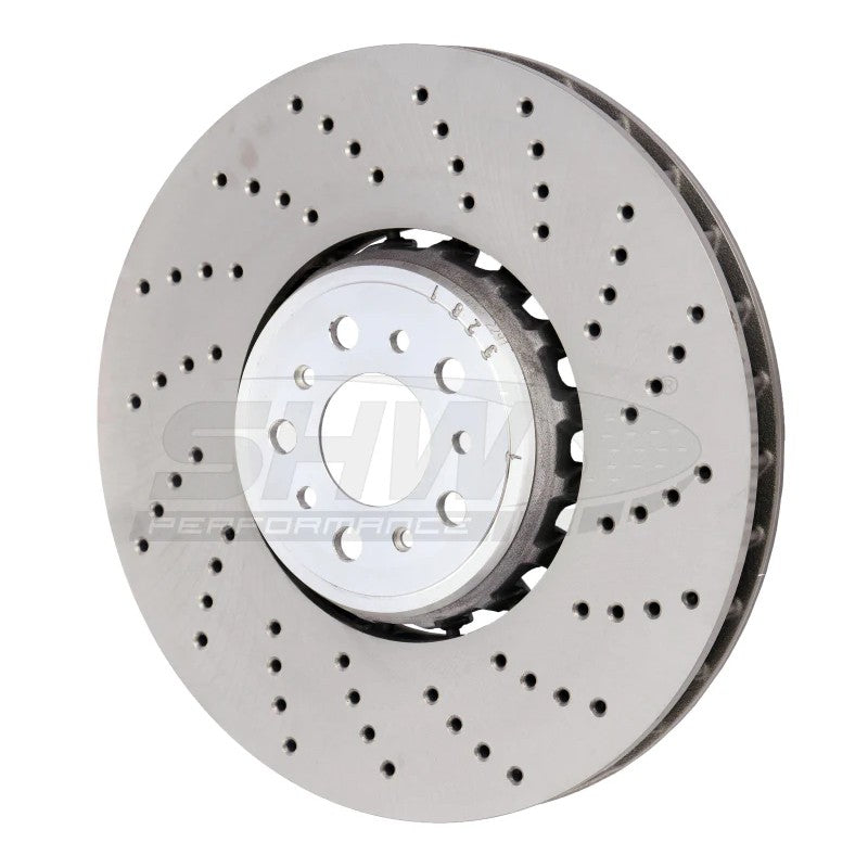 SHW cross-drilled lightweight front right brake rotor with aluminum center hat and vented friction surface for BMW M5.